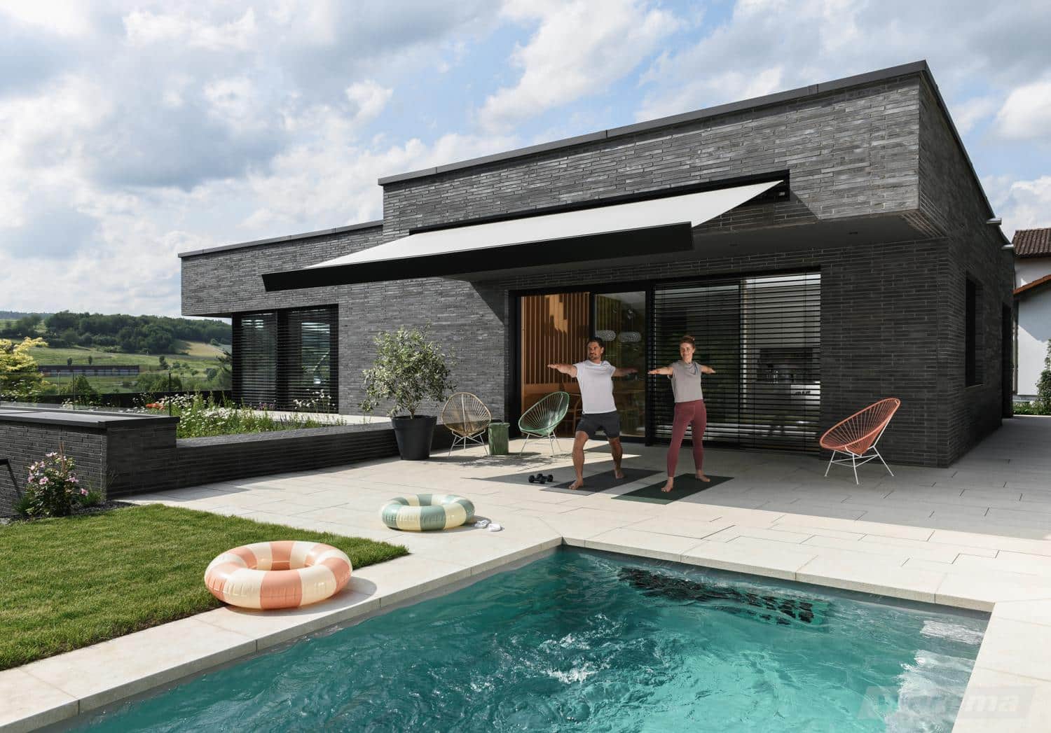 WAREMA Terrea 700S indbygget i en mørk facade over en terrasse