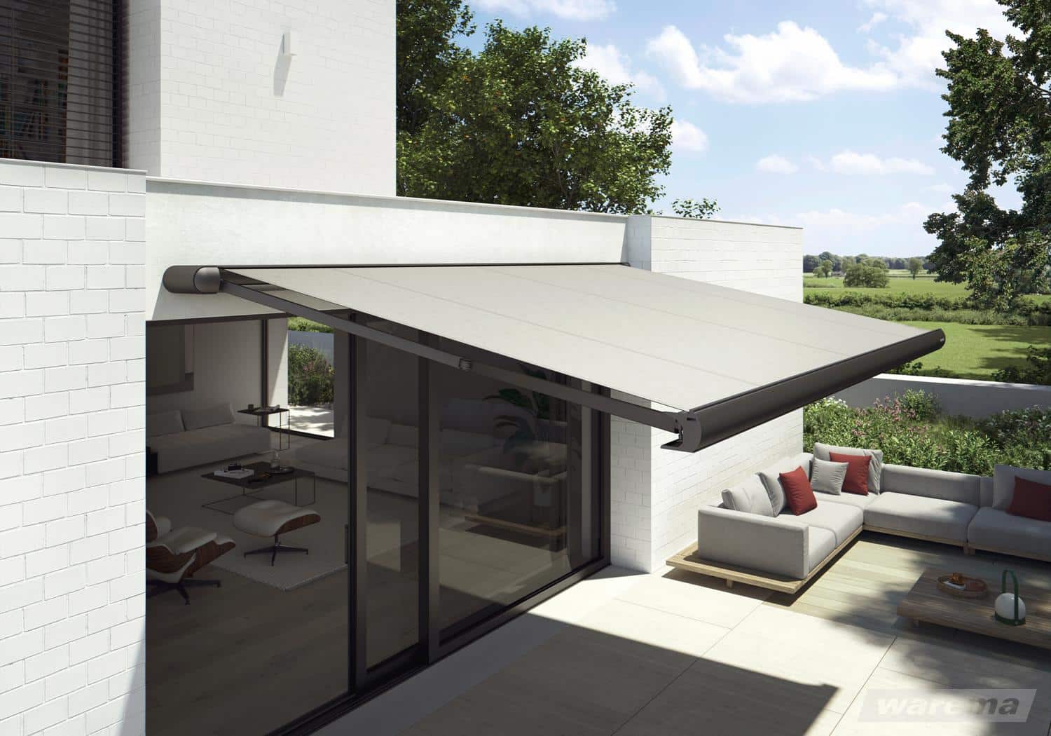 WAREMA Terrea K55 med lys markisedug over en terrasse ved et moderne hus