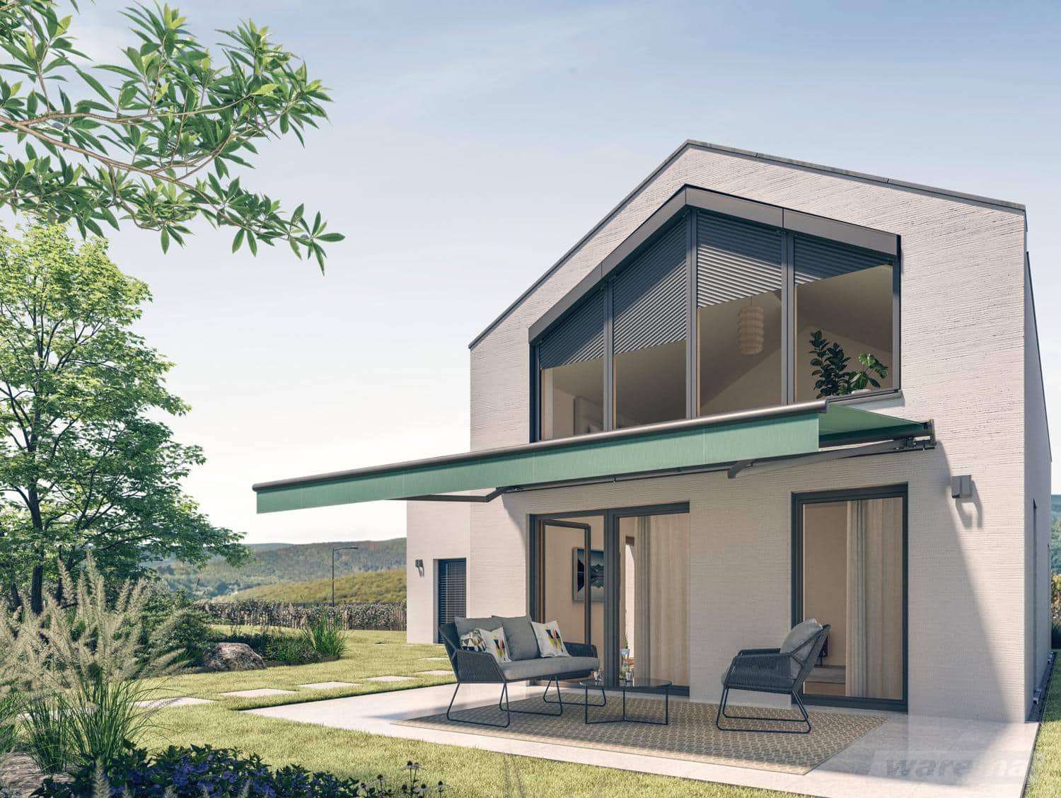 Terrea H60 med grønt stel på gavlen af et moderne hus